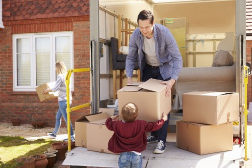 Packed boxes and furniture ready for transport in Edgware