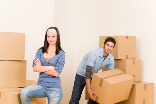 Packed office boxes and furniture ready for relocation